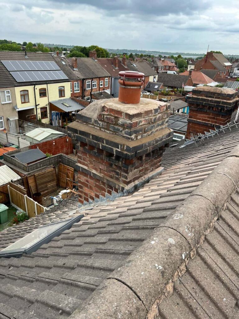 This is a photo taken from a roof which is being repaired by Heanor Roofing Repairs, it shows a street of houses, and their roofs